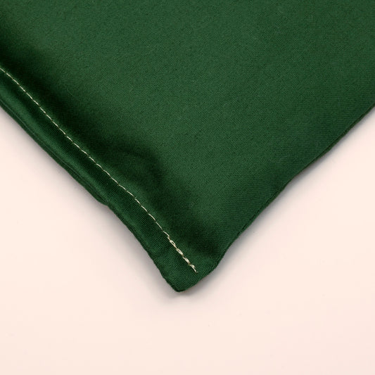 Donkergroen pittenzakje bij Stapelstein