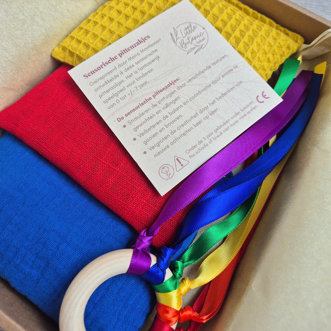Kraamcadeau met duurzaam speelgoed - Regenboog primaire kleuren